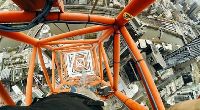 Daredevil Bryce Wilson filmed himself climb 304 metres up a crane on top of a skyscraper at Southbank. Photo: Bryce Wilson/Instagram