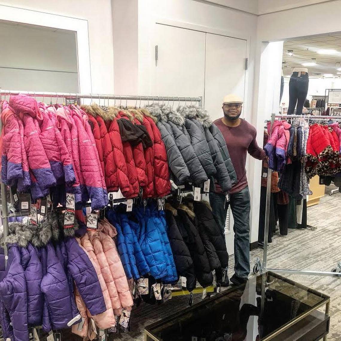 Hip-hop artist Devine Carama is collecting new coats for children in need in Central and Eastern Kentucky for the sixth year. He was at Macy’s department store in Lexington buying coats on November 29, 2019. Photo provided