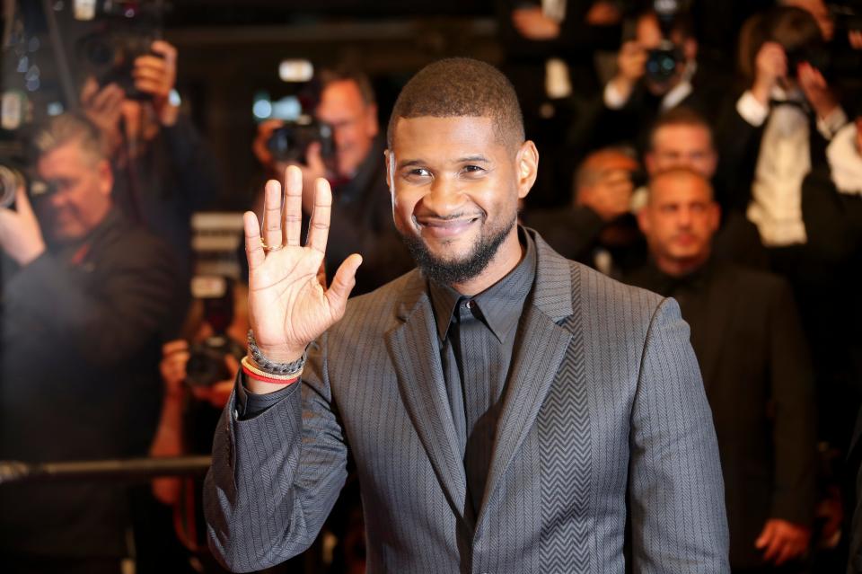 Actor Usher Raymond IV poses for photographers upon arrival at the screening of the film Hands of Stone at the 69th international film festival, Cannes, southern France, Monday, May 16, 2016. (AP Photo/Joel Ryan)