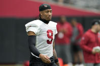 FILE - Arizona Cardinals linebacker Isaiah Simmons pauses on the field during NFL football training camp practice at State Farm Stadium, July 29, 2023, in Glendale, Ariz. Simmons was traded to New York on Aug. 24 by the Arizona Cardinals. Coming off a 40-0 loss to Dallas, the Giants travel to Arizona to play the Cardinals, Sunday, Sept. 17. (AP Photo/Ross D. Franklin, File)