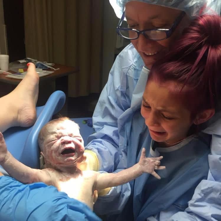 A 12-year-old girl had the lesson of a lifetime this week when she got to not only attend the birth of her baby brother but also deliver him. Source: Facebook/ZackNdede Carraway