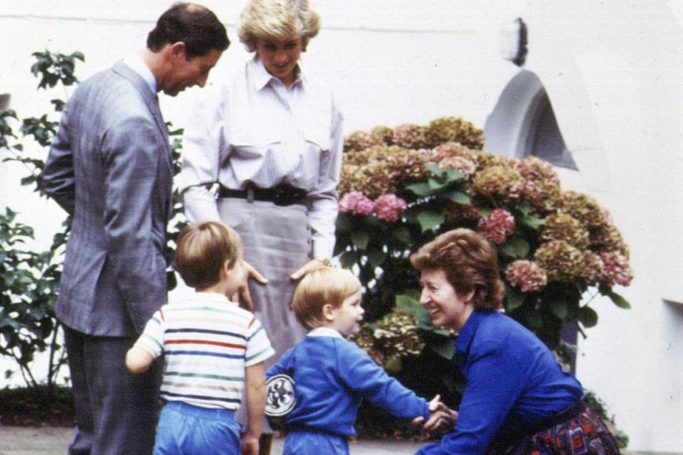 Prince Charles and Princess Diana with their children, Prince William and Prince Harry on Harry's first day of nursery school (PA)