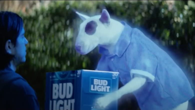 Spuds Mackenzie ghost hands person a case of beer