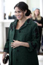 FILE - In this March 11, 2019 file photo, Britain's Meghan, Duchess of Sussex arrive for the Commonwealth Day Youth Event with Prince Harry, at Canada House in London. With another royal baby on the horizon, the debate over postpartum perfection is alive and well. As it stands, we don’t know whether Meghan Markle will follow in the footsteps of Kate Middleton when it comes to that magical perfection, but we have an inkling she’ll at least slap on some makeup when she introduces the latest royal to the world next month. (Chris Jackson/Pool Photo via AP, File)
