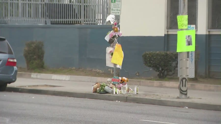 A makeshift memorial seen near Carver Middle School is devoted to Derrick Serrano. (KTLA)