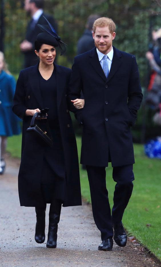 The Duke and Duchess of Sussex arrive to attend the Christmas Day church service at Church of St Mary Magdalene on the Sandringham estate on 25 December 2018 (Getty Images)