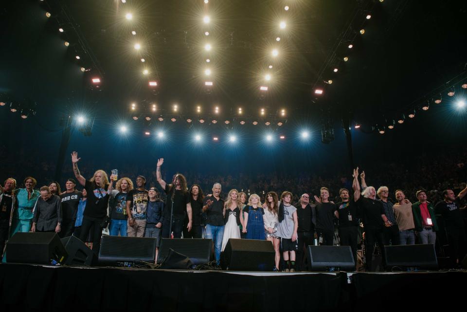 Performers from the Taylor Hawkins tribute concert in L.A. line up for a final bow