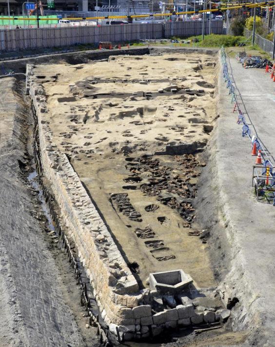 The grave was during excavations as part of a redevelopment plan near the main train station in the port city of Osaka (Osaka City Cultural Properties Association via AP)