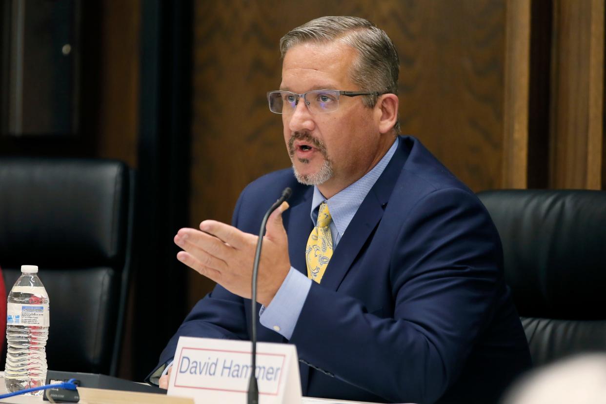 District attorney candidate David Hammer speaks during a forum Monday night in Shawnee.