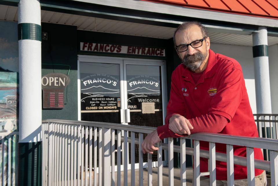 Franco Manzi stands in front of his namesake restaurant, Franco's Italian Restaurant, in Pensacola on Friday. Manzi, along with his two partners Giovanni Volpara and the late Gennaro "Geno" Intermoia, started the restaurant 23 years ago.
