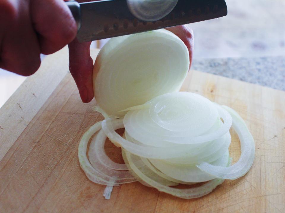 slicing white onion