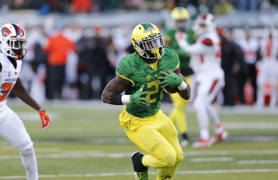 Oregon's Royce Freeman rushed for 1,836 yards in 2015. (AP Photo/Timothy J. Gonzalez)