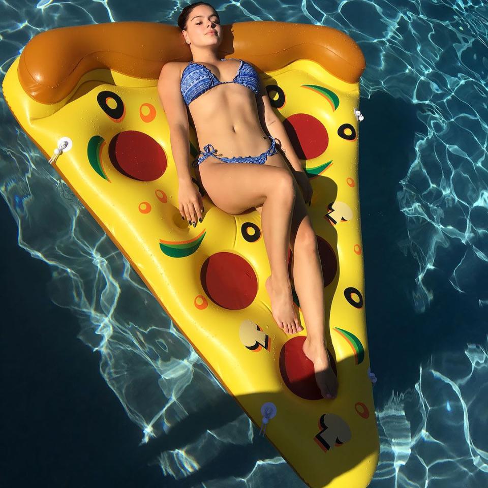 <p>Max chilling on a max pizza.</p>