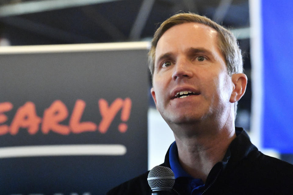 Kentucky Governor and Democratic candidate for re-election Andy Beshear speaks to supporters during a stop of his statewide bus tour in Richmond, Ky., Monday, Oct. 30, 2023. (AP Photo/Timothy D. Easley)