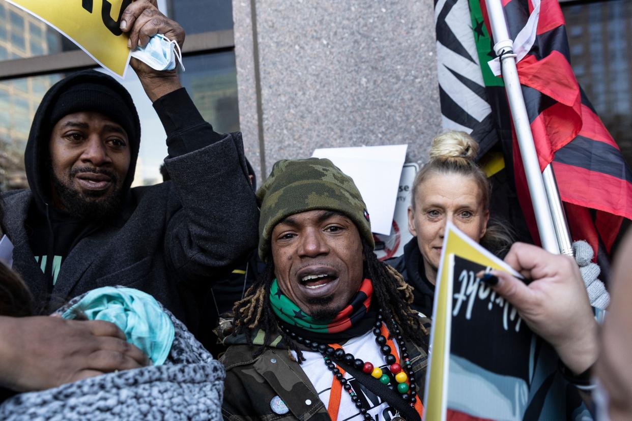 People celebrate at George Floyd Square after the verdict was announced in the trial of former police officer Kim Potter in Minneapolis, Minn. on Dec. 23, 2021.