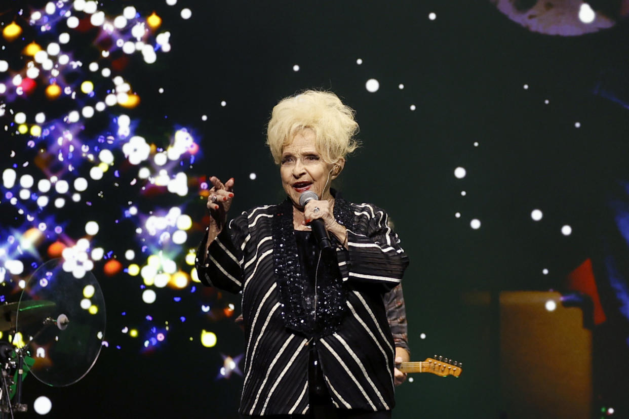 Recent photo of Brenda Lee singing. 