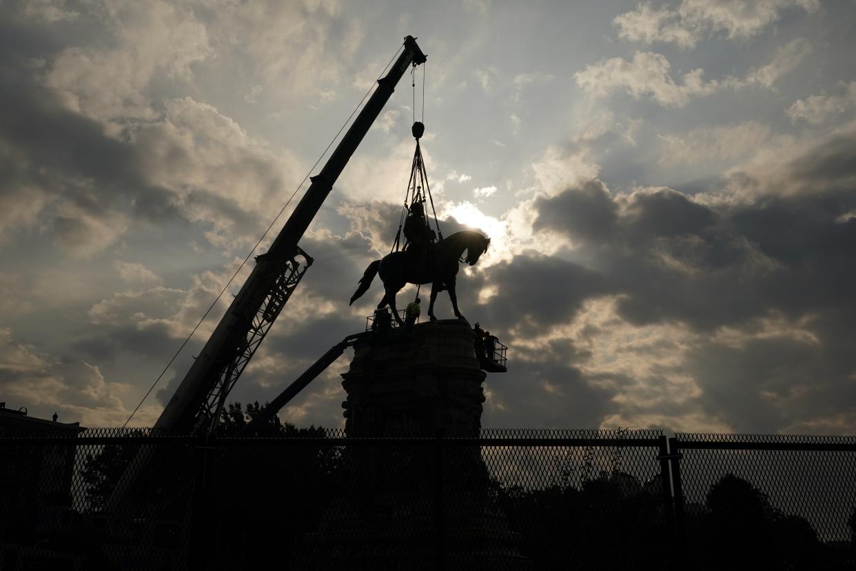 Crews prepare to remove one of the country's largest remaining monuments to the Confederacy, a towering statue of Confederate General Robert E. Lee on Monument Avenue, September 8, 2021 in Richmond, Virginia. (Steve Helber/Getty Images)