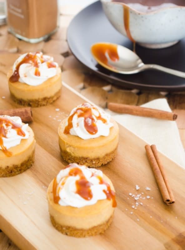 <p>Flavor the Moments</p><p>Mini salted caramel pumpkin cheesecakes are creamy, mini pumpkin cheesecakes topped with salted caramel sauce and whipped cream!</p><p><strong>Get the recipe: <a href="https://flavorthemoments.com/mini-salted-caramel-pumpkin-cheesecakes/" rel="nofollow noopener" target="_blank" data-ylk="slk:Mini Salted Caramel Pumpkin Cheesecakes;elm:context_link;itc:0;sec:content-canvas" class="link ">Mini Salted Caramel Pumpkin Cheesecakes</a></strong></p>