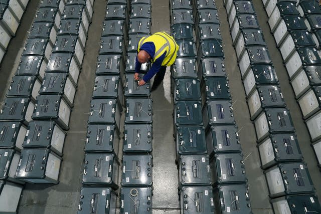 Ballot boxes being prepared for the election  in a warehouse