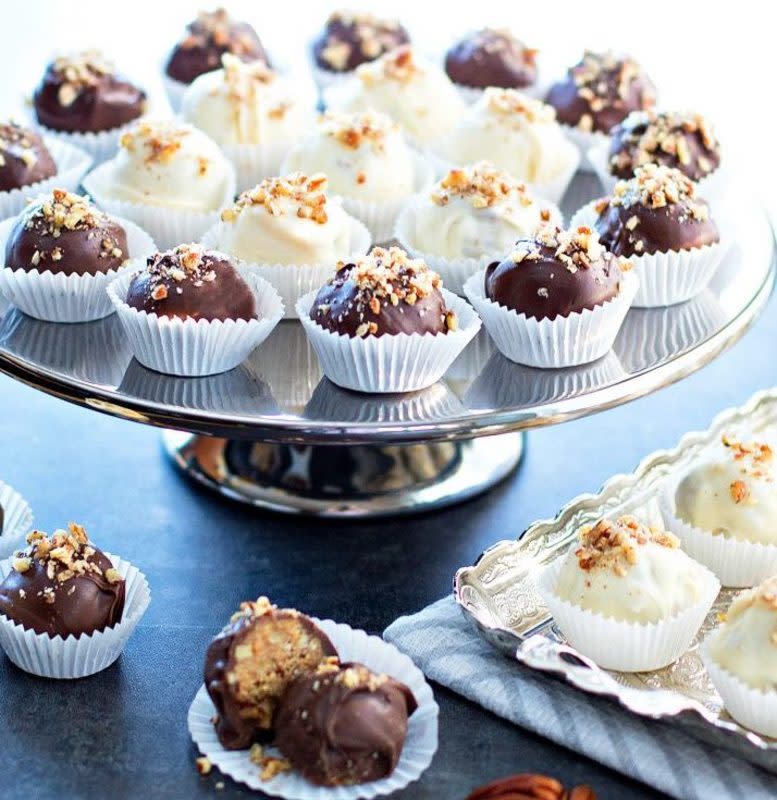 <p>Melissa's Southern Style Kitchen</p><p>A bite-sized holiday treat.</p><p><strong>Get the recipe: <a href="https://www.melissassouthernstylekitchen.com/pecan-balls/" rel="nofollow noopener" target="_blank" data-ylk="slk:Pecan Balls;elm:context_link;itc:0;sec:content-canvas" class="link rapid-noclick-resp">Pecan Balls</a></strong></p>