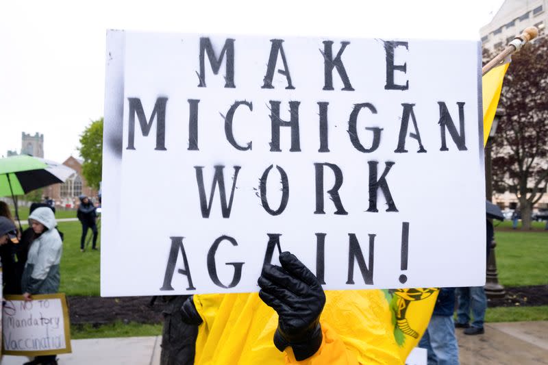 FILE PHOTO: Protesters against the state's extended stay-at-home order demonstrate in Lansing