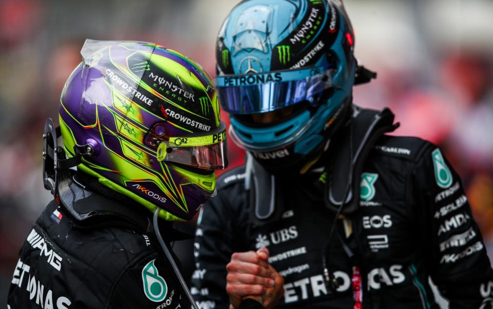 Eighth placed George Russell of Great Britain and Mercedes and Sixth placed Lewis Hamilton of Great Britain and Mercedes talk in parc ferme during the F1 Grand Prix of Azerbaijan at Baku City Circuit on April 30, 2023 in Baku, Azerbaijan - Getty Images/Joe Portlock