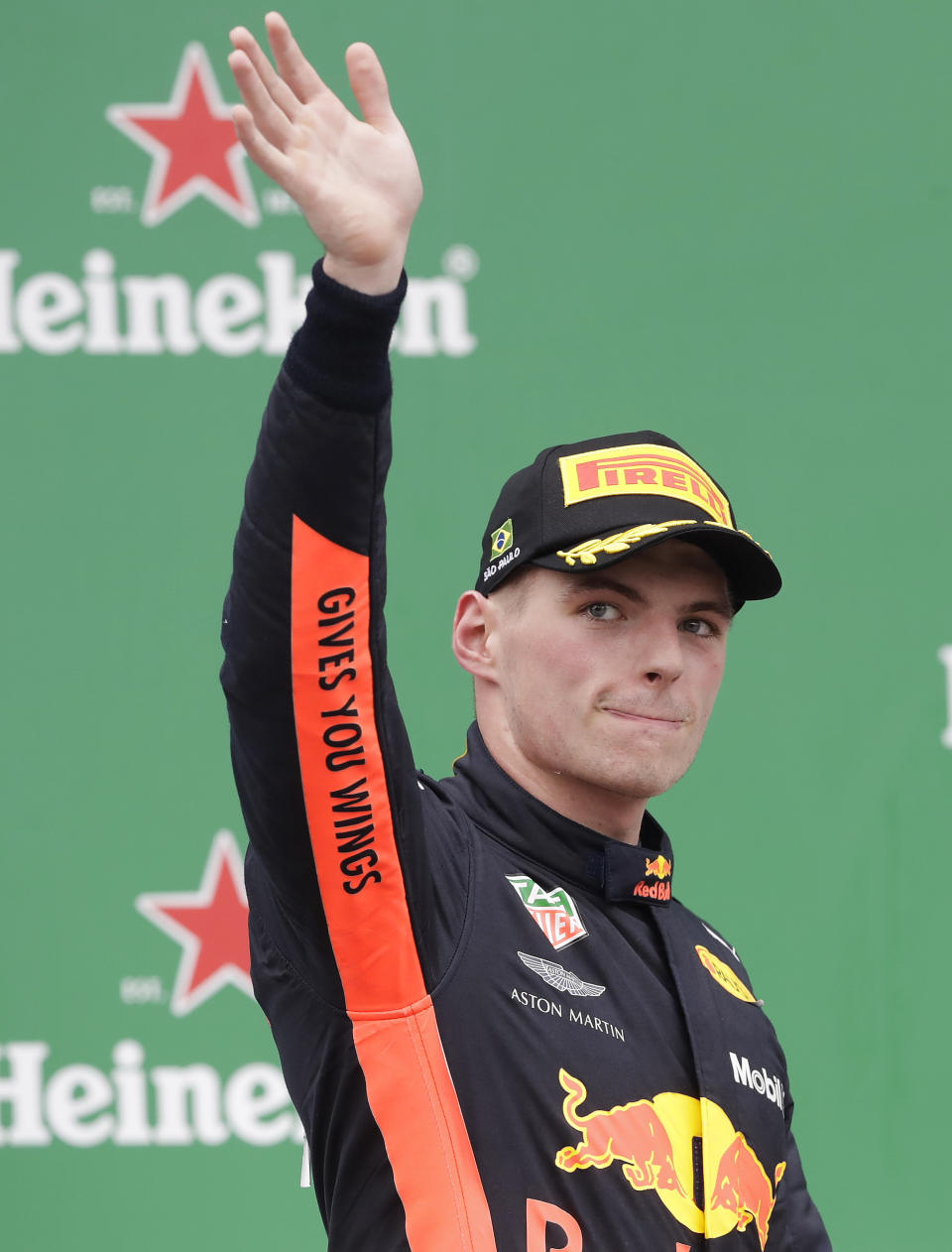 Red Bull driver Max Verstappen, of Netherlands, celebrates finishing second in the Brazilian Formula One Grand Prix at the Interlagos race track in Sao Paulo, Brazil, Sunday, Nov. 11, 2018. (AP Photo/Andre Penner)