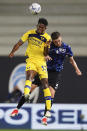 Atalanta's Emil Holm, rightm, and Hellas Verona's Juan Cabla battle for the ball during the Serie A soccer match between Atalanta and Hellas Verona at Gewiss stadium, Bergamo, Italy, Monday April 15, 2024. (Spada/LaPresse via AP)