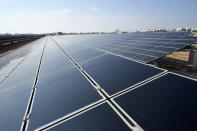 Solar panels sit at Masdar City near Abu Dhabi, United Arab Emirates, as Dubai hosts the COP28 U.N. Climate Summit, Friday, Dec. 8, 2023. (AP Photo/Kamran Jebreili)