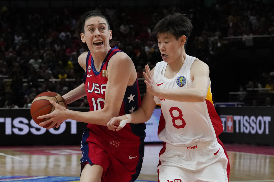 United States' Breanna Stewart runs at China's Jin Weina during their gold medal game at the women's Basketball World Cup in Sydney, Australia, Saturday, Oct. 1, 2022. (AP Photo/Mark Baker)