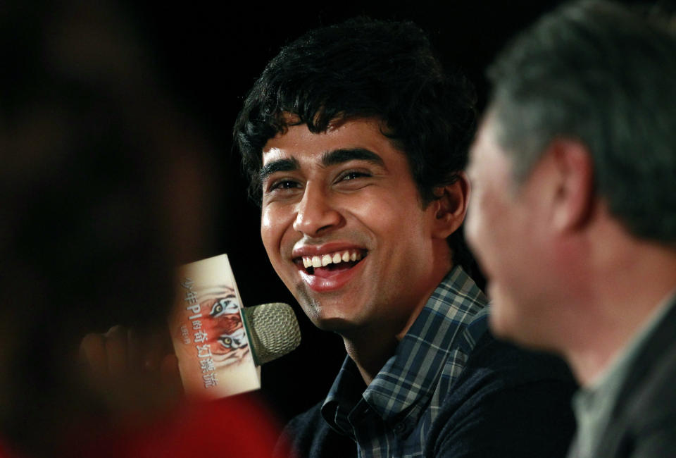 Lead actor from India Suraj Sharma answers questions about director Ang Lee during a press conference announcing their new film "Life of Pi," in Taipei, Taiwan, Wednesday, Nov. 7, 2012. "Life of Pi" is an upcoming 3D adventure film based on the 2001 novel of the same name by Yann Martel, staring Sharma and directed by Lee. (AP Photo/Wally Santana)