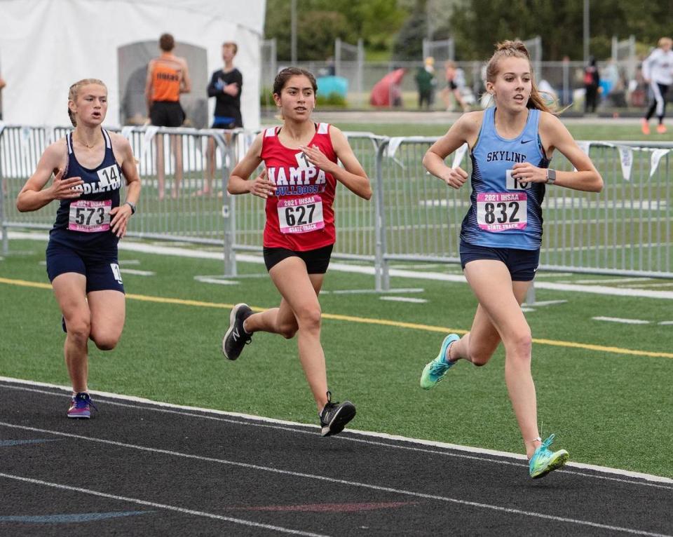 Kayelee Austin of Middleton, Cassandra Vasquez of Nampa and Nelah Roberts of Skyline run the 4A 3,200 meters at the IHSSA track and field state championships held at Eagle High School in 2021. Roberts finished first with Austin in second and Vasquez in third place.