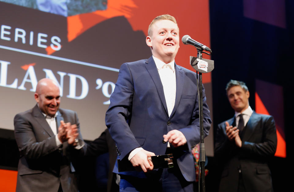 Thomas Turgoose and the cast of "This is England 90" on stage after winning the Best TV Series award during the Jameson Empire Awards 2016. (Photo by Tristan Fewings/Getty Images)