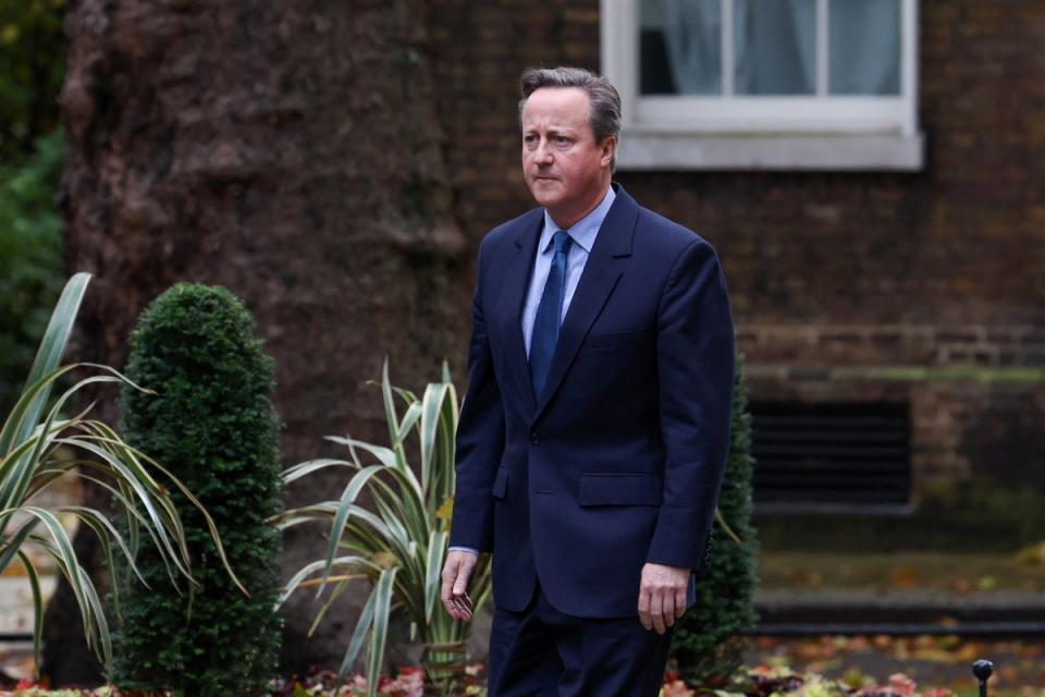 David Cameron was seen walking into No10 on Monday morning (REUTERS)