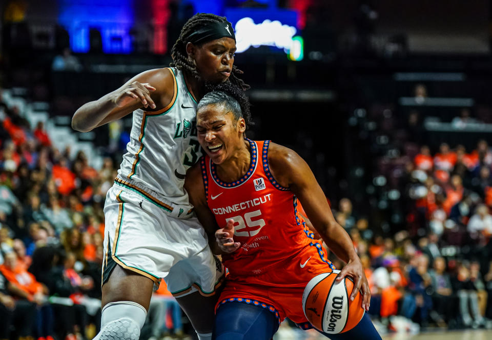 Connecticut Sun forward Alyssa Thomas (35) moves the ball against New York Liberty forward Jonquel Jones during Game 3 of the WNBA semifinals in Uncasville, Conn., on Sept. 29, 2023. (David Butler II/USA TODAY Sports)