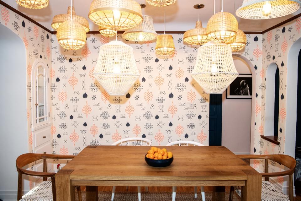 Multiple basket-covered pendants create a stunning lighting arrangement.