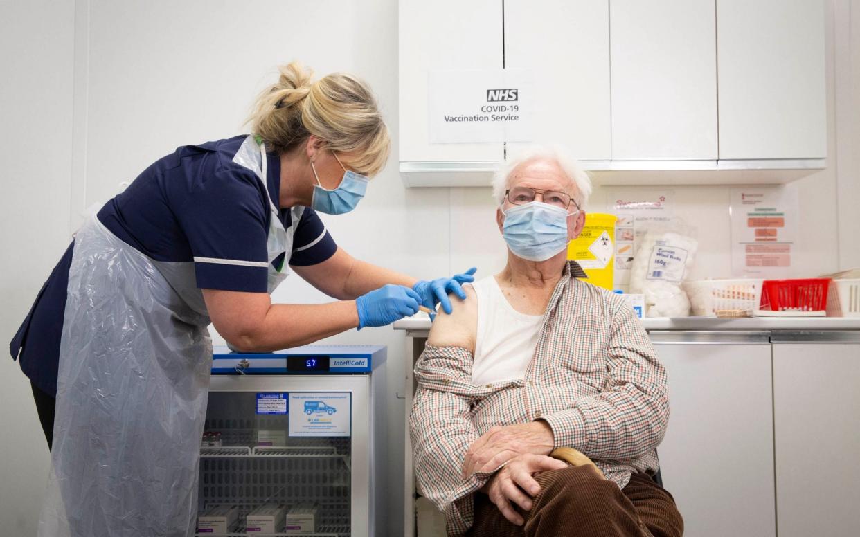 87-year-old Peter Cast from Ashtead, Surrey, receives the AstraZeneca vaccine - Matt Alexander/PA