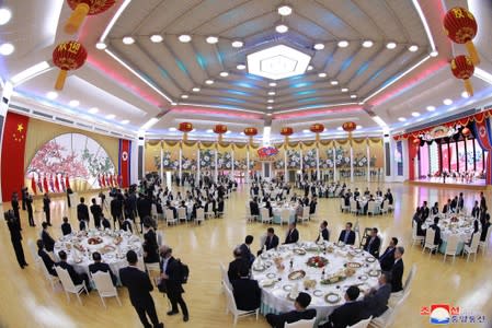 North Korean leader Kim Jong Un and Chinese President Xi Jinping attend a banquet in Pyongyang