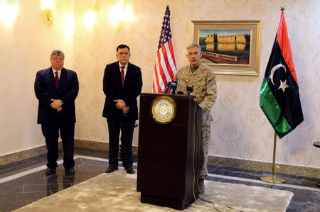 Marine General Thomas Waldhauser, the top U.S. military commander overseeing troops in Africa, speaks during a news conference with the U.S. ambassador to Libya Peter Bodde (L) and Prime Minister of Libya's Government of National Accord (GNA) Fayez Seraj, in Tripoli, Libya May 23, 2017. REUTERS/Hani Amara