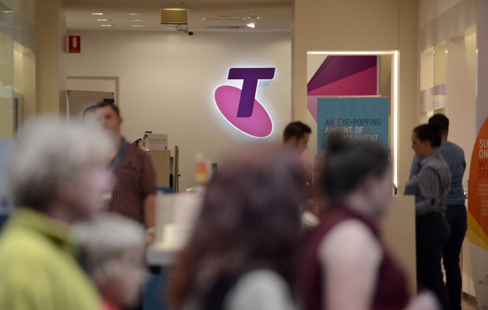 A Telstra shop with customers. 