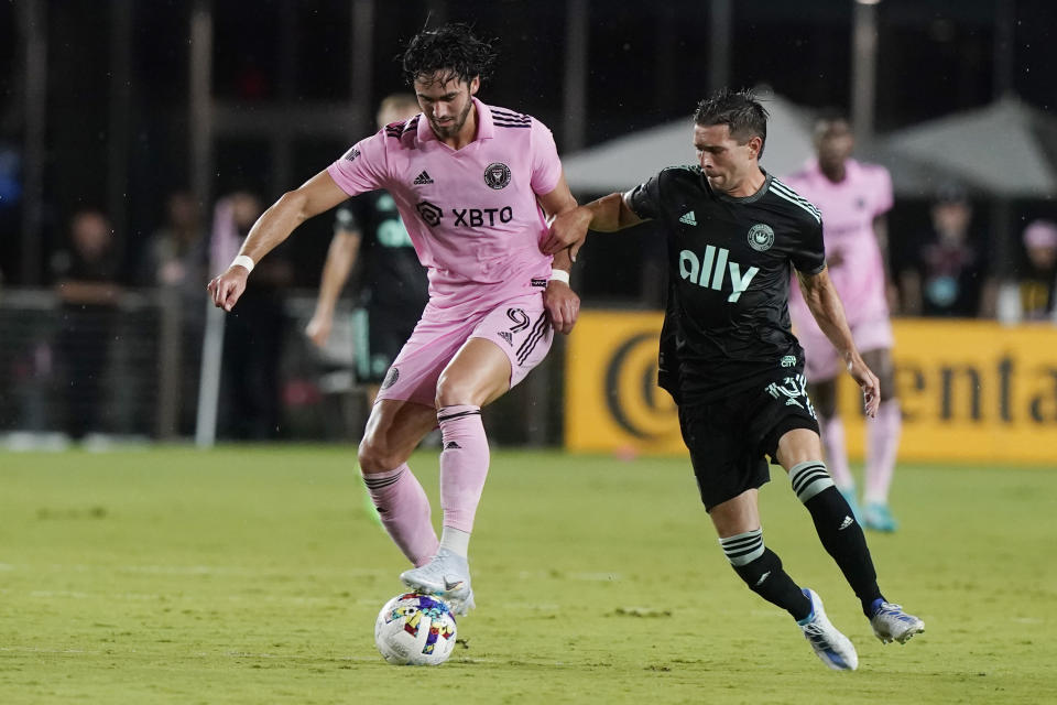 Inter Miami forward Leonardo Campana (9) works with the ball as Charlotte FC midfielder Brandt Bronico (13) defends during the first half of an MLS soccer match Saturday, July 16, 2022, in Fort Lauderdale, Fla. (AP Photo/Marta Lavandier)