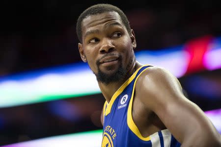 Nov 18, 2017; Philadelphia, PA, USA; Golden State Warriors forward Kevin Durant (35) glances over his shoulder to fans as time winds down during the fourth quarter against the Philadelphia 76ers at Wells Fargo Center. Bill Streicher-USA TODAY Sports