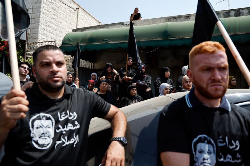 Relatives and friends take part in the funeral of Abdelrahman Kashua, director general of the Arab city of Tira in Israel, who was fatally shot as criminal violence surges in Arab communities, in Tira