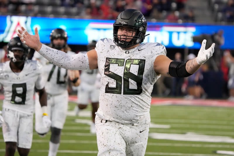 Oregon offensive lineman Jackson Powers-Johnson (58) in the first half during an NCAA college football game against <a class="link " href="https://sports.yahoo.com/nfl/teams/arizona/" data-i13n="sec:content-canvas;subsec:anchor_text;elm:context_link" data-ylk="slk:Arizona;sec:content-canvas;subsec:anchor_text;elm:context_link;itc:0">Arizona</a>, Saturday, Oct. 8, 2022, in Tucson, Ariz. Powers-Johnson is projected to be either a first or second-round draft pick in the 2024 NFL draft. | Rick Scuteri