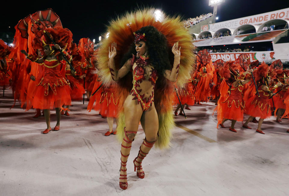 <p>Revellers from Unidos da Tijuca Samba school perform during the second night of the Carnival parade at the Sambadrome in Rio de Janeiro, Brazil, Feb. 12, 2018. (Photo: Pilar Olivares/Reuters) </p>