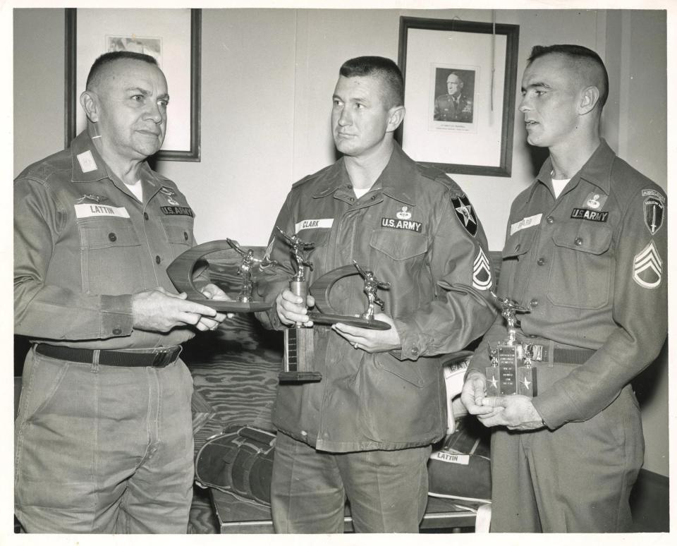 Retired Command Sgt. Maj. David Clark, center,  teaches an Air Force general how to jump (left) and accepts awards for his parachute skills in 1960 at Fort Benning, Georgia.