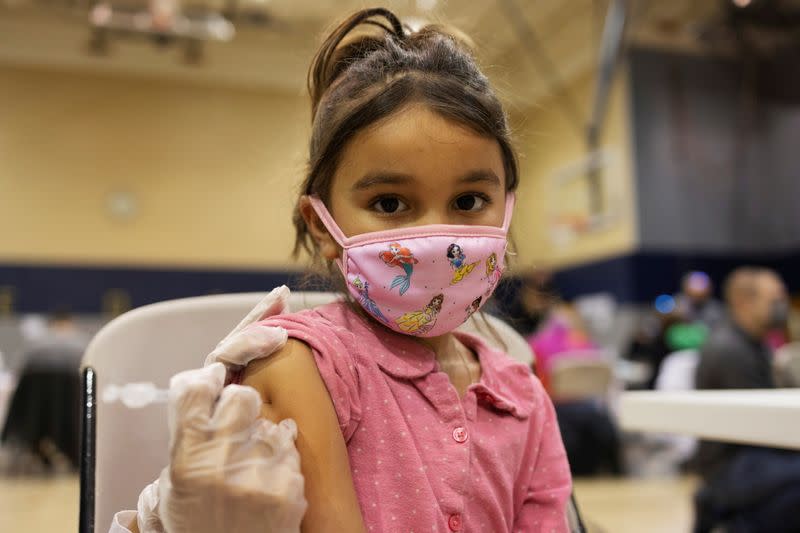 FILE PHOTO: Children age 5-11 receive vaccination against the coronavirus disease (COVID-19)