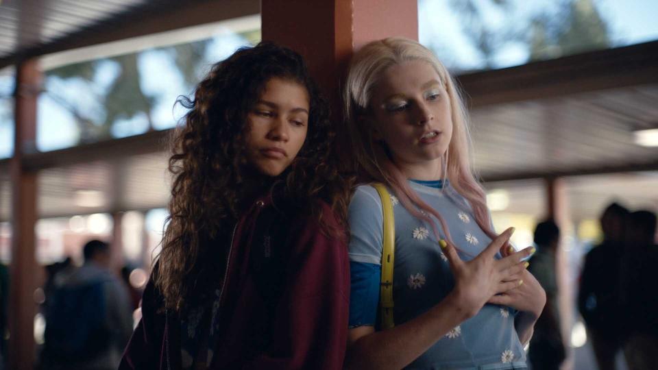 This image released by HBO shows Zendaya, left, and Hunter Schafer in a scene from the series “Euphoria." LGBTQ and gender inclusiveness on television has retreated slightly this season due to delays and shutdowns cased by the COVID-19 pandemic, according to a new study out Thursday by the advocacy group GLAAD. There were also declines in LGBTQ representation on streaming services and prime-time scripted cable shows, triggered in part by production shutdowns of such series as “The L Word,” “Euphoria" and “Killing Eve.” (HBO via AP)