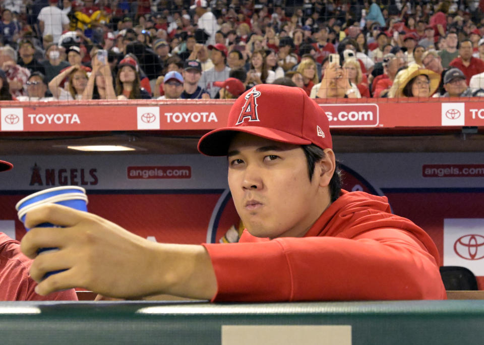 In his very brief TV interview after winning AL MVP, Shohei Ohtani didn't reveal any hints of where he's leaning in free agency. The mystery continues. (Photo by John McCoy/Getty Images)