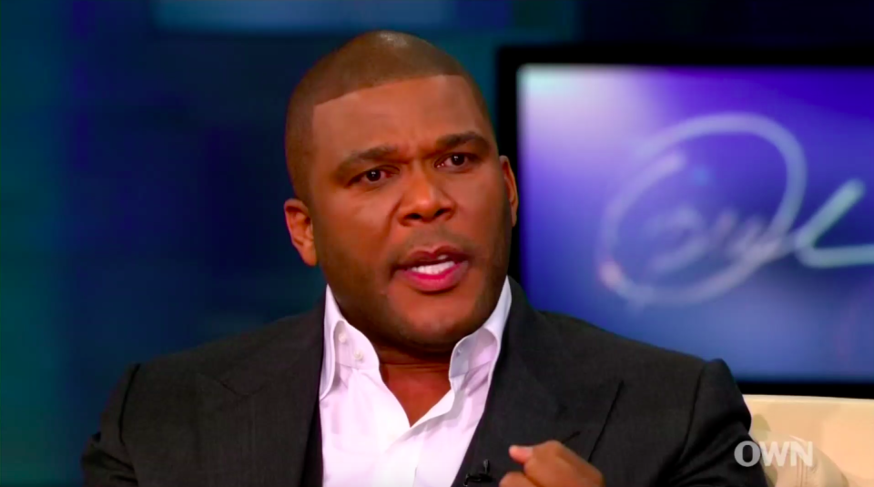 Tyler Perry spoke of his childhood abuse in an emotional appearance on <em>The Oprah Winfrey Show</em> in 2010. (Photo: OWN)